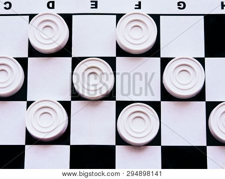 Checkerboard With Checkers. Business Strategy Competition, Strategic Planning For Winning Success. H