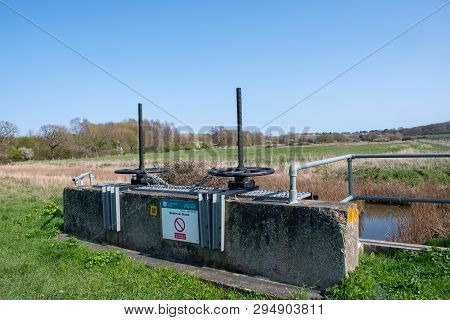 Wrabness Suffolk Uk  - 1 April  2019:  Flood Control Sluice Used For Water Management On Flood Plain