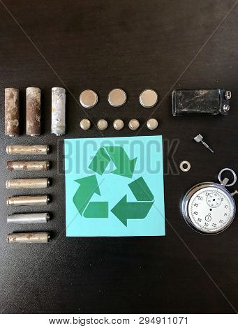 Corrosion-free Batteries.  Different Size And Shape.  A Broken Stopwatch. Recycling And Environmenta