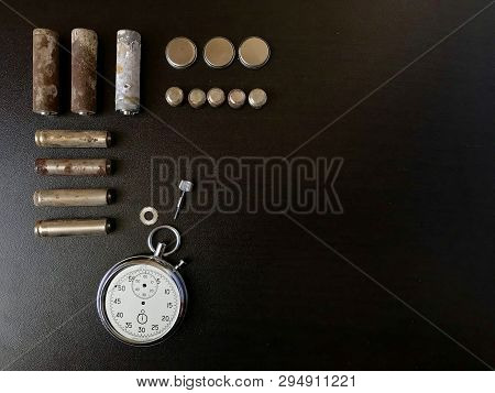 Corrosion-free Batteries.  Different Size And Shape.  A Broken Stopwatch. Recycling And Environmenta