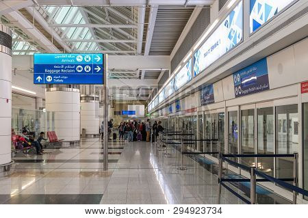 Dubai, Uae - March 27. 2019. People Are Waiting Train In The Dxb Airport Arrival Terminal