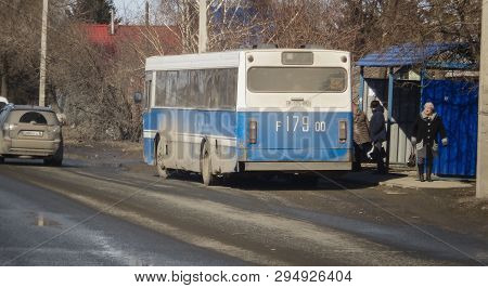 Kazakhstan, Ust-kamenogorsk, March 13, 2019: People At The Bus Stop. People On The Street. Urban Lan