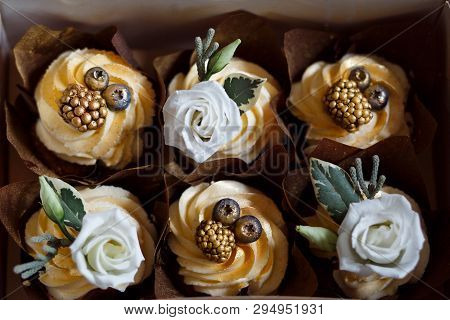 Six Cakes C Cream Decorated With White Roses, Blueberries And Blackberries And Covered With Golden P