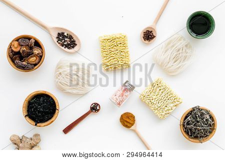 Chinese And Japanese Food Cooking With Ginger, Spices And Noodles On White Background Top View Geome