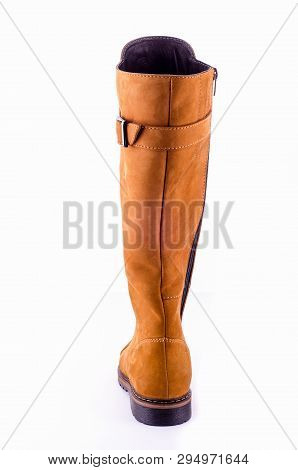 Beige Woman Long Boot Shoe Isolated On White Background. Fashionable Boots For Women May Exhibit All
