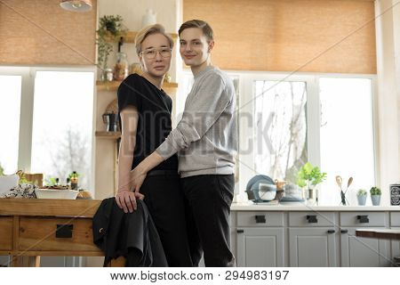 Close Up Portrait Of Two Young International Gay Men In Casual Clothes, One Asian Blonde Men In Eyeg