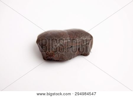 Hematite Stone, Stone Surface With Layers Of Hematite And Layers Of Quartz. Iron Ore Isolated On Whi