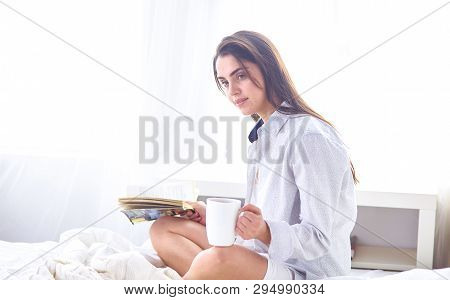 Young Beautiful Happy Brunette Woman In Black Silk Dressing Gow