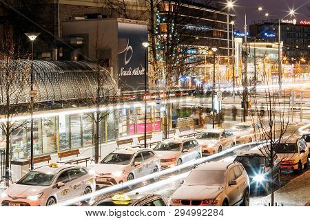 Tallinn, Estonia - December 3, 2016: Toyota Avensis Taxi Cars Parking Near Viru Gates Entrance To Ol