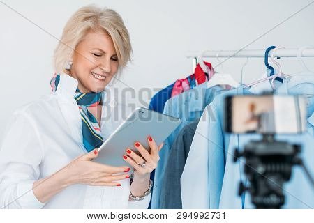 Stylish Senior Lady. Happy Facial Expression. Successful Fashion Consultant. Vlog Shooting Hobby Enj