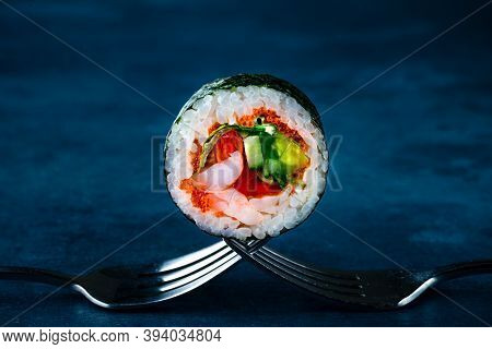 Traditional Japanese Futomaki Roll Stuffed With Tobiko Caviar, Cucumber, Crab Meat And Tomato, Futom