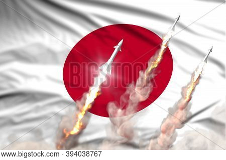 Japan Nuclear Missile Launch - Modern Strategic Nuclear Rocket Weapons Concept On Flag Fabric Backgr