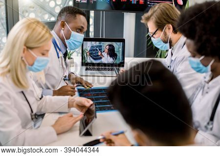 Medical And Healthcare Concept. Team Of Multiethnic Diverse Doctors Scientists, Wearing Face Masks, 