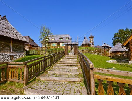 Traditional village Drvengrad Mecavnik in Serbia - architecture travel background