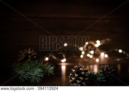 2021 New Year's Eve Bokeh, Pine Cones Composition With Text Mock-up Evening Dark Flashlights, Christ