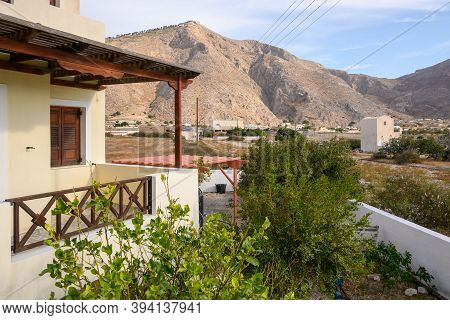 Santorini, Greece - September 16, 2020: Summer Villa Overlooking The Mesa Vouna Mountain In Perissa
