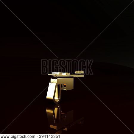 Gold Mauser Gun Icon Isolated On Brown Background. Mauser C96 Is A Semi-automatic Pistol. Minimalism