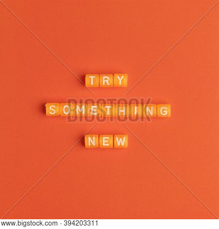 TRY SOMETHING NEW beads message typography