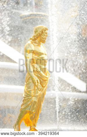 Sculptures Of Peterhof Fountains In The Summer