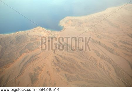 View from the airplane window of the mountains and sea resort of Egypt, Sharm El Sheikh.Flight from Kiev