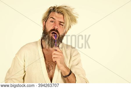 Feeling Sleepy In Bathroom. Man In Bathrobe Brush His Teeth. Good Morning. Male Health Care And Pers