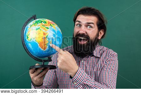 Just Look Here. Nonformal Education. Male Student In School Classroom While Geography Lesson. Pass T