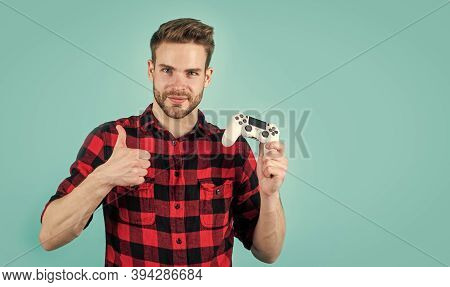 Thumb Up For Success. Modern Technology And Engineering. Video Game Console. Guy Playing On Console.