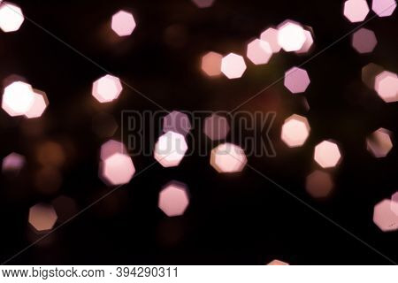 Abstract Christmas Silver And Pink Lights Onbackground Blurred