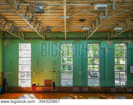 Zielona Gora June 9 2019 Empty Dirty Ruined Gym Hall In Old School With Punching Bags