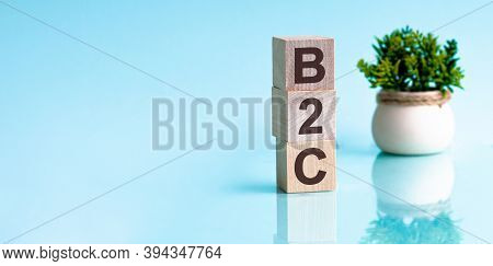 Letter Of The Alphabet Of B2c On A Light Blu Background. B2c - Business-to-consumer