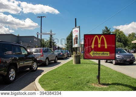 Vancouver,canada - July 13,2020: Cars Lining Up To Order Food Using Drive-thru Facilities At Local M
