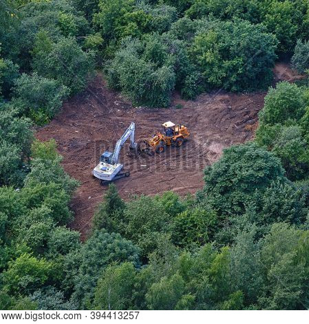 Excavators And Bulldozers Are Being Built In The Park, Top View - July 10, 2020, Moscow, Russia