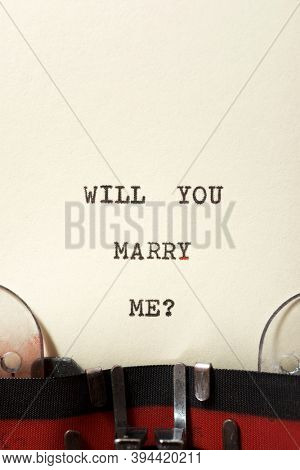 Will you marry me? phrase written with a typewriter.