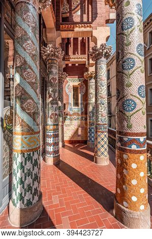 Barcelona, Spain - Feb 24, 2020: Intricate Mosaics Cermic Tiles Columns On Balcony Catalonia Music H