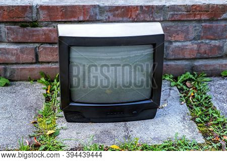 Old Analog Television Set On The Street Outdoor