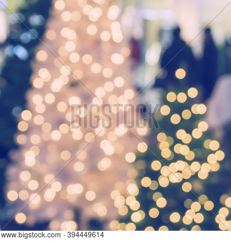 Сhristmas Tree In Shopping Mall, Defoused Holiday Background.