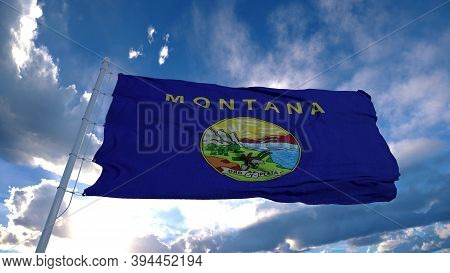 Montana Flag On A Flagpole Waving In The Wind, Blue Sky Background. 3d Rendering