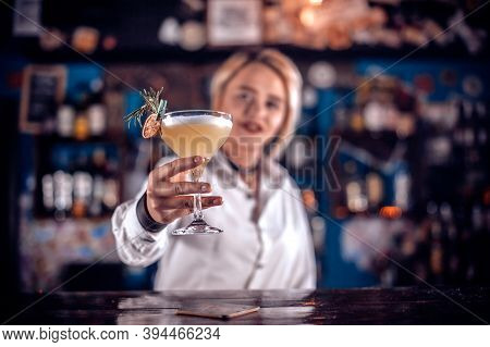 Charismatic Girl Tapster Creates A Cocktail On The Bar
