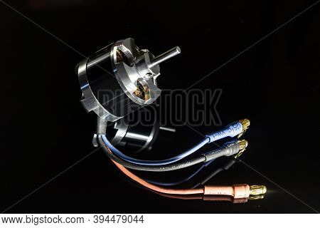 Aircraft Model Brushless (bldc) Outrunner 3-phase Motor On A Black Background. Selective Soft Focus.