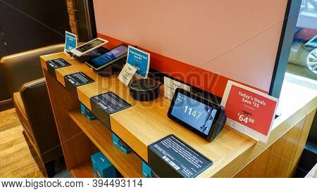 Seattle, Wa/usa-9/15/19: An Amazon Kindle Paperwhite, Fire, Alexa Echo Dot, And Echo Show 5 For Sale