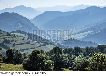 Big Fatra Mountains, Liptovske Revuce Village, Slovak Republic. Seasonal Natural Scene. Travel Desti