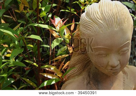 Escultura, potteryand plantas