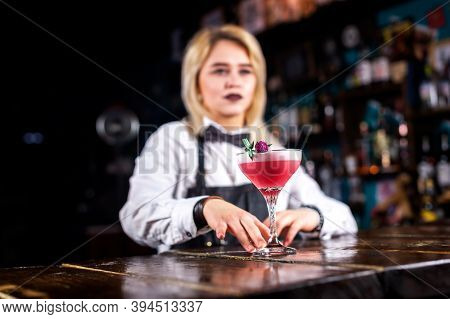 Girl Barman Formulates A Cocktail In The Taproom