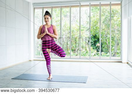 Asian Women Workout Practicing Yoga Training Put On Pink Clothes And Practice Meditation Wellness Li