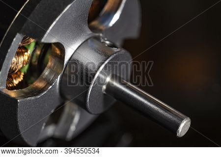 Brushless Motor (bldc) Outrunner For Aircraft Model Close-up On A Black Background. Selective Focus.