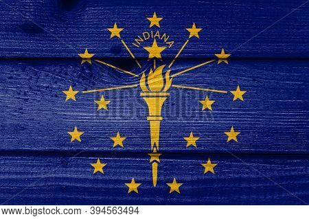 Indiana Flag Painted On Old Wood Plank Background. Brushed Natural Light Knotted Wooden Board Textur