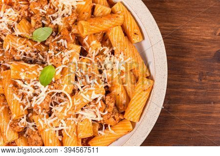 Cooking Tortiglioni With Onion And Sausage Ragout, Pasta With Sausage Sauce With Onions And Tomato P