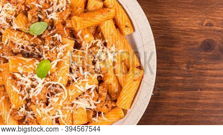 Cooking Tortiglioni With Onion And Sausage Ragout, Pasta With Sausage Sauce With Onions And Tomato P