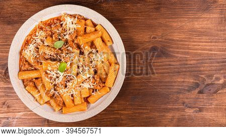 Cooking Tortiglioni With Onion And Sausage Ragout, Pasta With Sausage Sauce With Onions And Tomato P