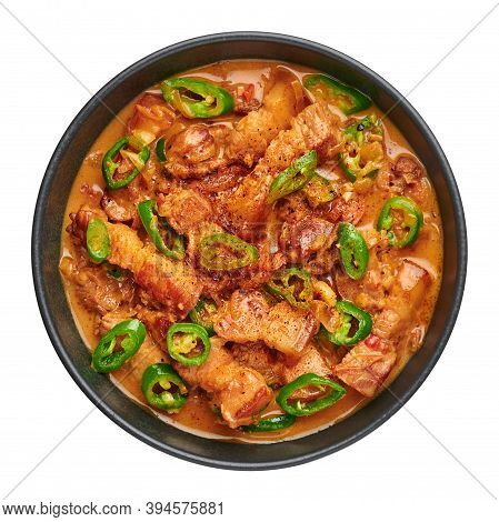 Bicol Express Stew In Black Bowl Isolated On White. Filipino Cuisine Spicy Pork Belly Coconut Milk C